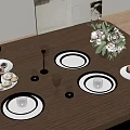 Elegant Dining Table Setup With Brown Surface Plates Candles Wine Glasses And Pink Flowers Vase