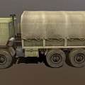 Green Military Cargo Truck With Canvas Covered Bed And Off Road Tires