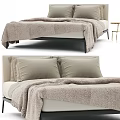 Modern Minimalist Double Bed With Upholstered Headboard Soft Blanket And Neutral Pillows
