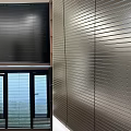 Black Window Blinds In Modern Interior With Metal Striped Wall Design