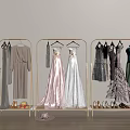 Clothes Racks Holding Different Dresses Gowns Shoes and Hat in Indoor Area with Light Wall