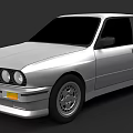 Silver BMW Classic Two Door Car With Round Headlights And Alloy Wheels