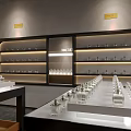 Modern Boutique Store Interior With Marble Counter Display Shelves And Hanging Pendant Lamp