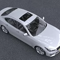 Silver Infiniti Sedan With Sleek Front Design Headlights And Grille In Outdoor Setting