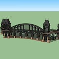 Twin Towers With Classical Decorative Arch Bridge Structure Under Blue Sky