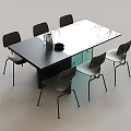 Modern Black Dining Table With Six Sleek Chairs And Minimalist Design