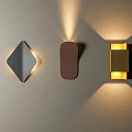 Modern Geometric Wall Lamps With Diamond Oval Square Shapes Illuminating Interior Wall