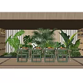 Lush Green Dining Table and Chair Set with Food Plates Among Tropical Plants