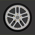 Car Wheel Featuring Silver Rim Design Black Tire And Yellow Bolts