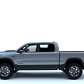 Silver RAM Crew Cab Pickup Truck With Modern Front Grille And Off Road Tires