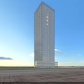 Modern Tall Hotel Building With Glass Facade And Open Surroundings Under Blue Sky