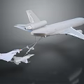 Large Tanker Aircraft Refueling Two Small Fighter Jets in Mid Air