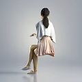 Woman Sitting On Chair In Pink Dress With Gray Shawl Holding Microphone And White Shoes