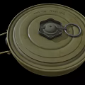 Green Circular TM 45 Anti Tank Mine Weapon Featuring 65 87 35 T Markings