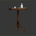 Daily Necessities Arranged On Wooden Round Side Table With Tray And Small Bottle