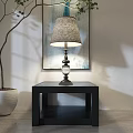 Elegant Table Lamp With Fabric Shade On Black Side Table And Decorative Painting