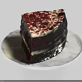 Delicious Layered Chocolate Cake With Cream Red Crumbs And Chocolate Chips On Patterned Plate