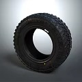Black Rubber Tire With Deep Tread Pattern And Durable Construction Design