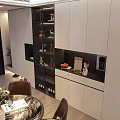 Modern Dining and Living Room Interior With White Cabinets Display Shelves And Decorative Painting