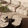 Modern Living Room With Plush Cream Sofa Round Coffee Tables Large Windows And Potted Plant