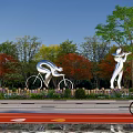 Silver Sports Sculptures in Outdoor Park With Trees Running Track And People Cycling Nearby