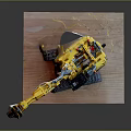 Detailed Yellow Excavator Model On Wooden Base With Tracks And Mechanical Arm