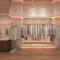 Modern Clothing Store Interior With Racks Of Hanging Clothes And Wooden Flooring