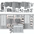 Modern Organized Wardrobe Interior With Hanging Clothes Drawers Shoes And Storage Bags