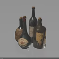Vintage Glass Bottles With Different Shapes Labels On Dark Reflective Surface