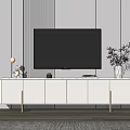 Modern White TV Stand With Flat Screen TV On Gray Striped Wall And Decorative Plant