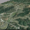 Aerial Planning of Mountainous Terrain With Rolling Hills Green Vegetation and Paths