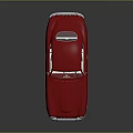Red Classic Vintage Sports Car With Streamlined Body White Wheels And Chrome Grille