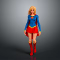 Blonde Superhero Female Character Standing In Blue Top Red Skirt Red Boots With Yellow Emblem