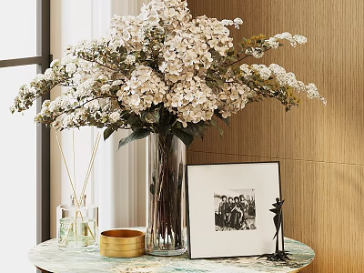White Blooms In Glass Vase With Framed Photo Gold Tray And Aromatherapy On Marble Tabletop 3d model