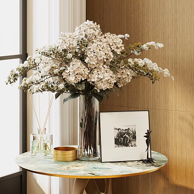 White Blooms In Glass Vase With Framed Photo Gold Tray And Aromatherapy On Marble Tabletop 3d model