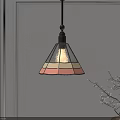 Stained Glass Pendant Light With Pastel Colors Hanging Over White Wall And Twig Decoration
