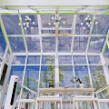 Transparent Glass Villa Balcony With White Frame Skylights Green Lawn And Red Flowers