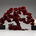 Elegant Red Orchid Arch Floral Display With Black Containers And Candles