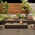 Outdoor Sofa Area with Fire Pit Coffee Table Lush Plants Rattan Chairs and Wooden Wall