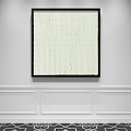 Black Framed White Abstract Painting On Minimalist White Wall With Wainscoting
