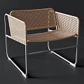 Modern Rattan Leisure Chair With Sleek Metal Frame And Comfortable Seat Design
