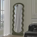 Green Wavy Frame Full Length Mirror Against Light Wall With White Curtain Black Sofa
