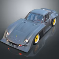 Gray Retro Sports Car with Sleek Body Yellow Wheels and Round Headlights