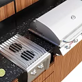 Modern Kitchen Cooking Appliances With Green Grill Sink And Wooden Black Countertop Cabinets