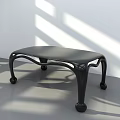 Modern Black Dining Table With Curved Legs In Light Shadow Interior