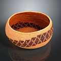 Handwoven Brown Storage Basket With Intricate Dark Geometric Patterns For Home Use