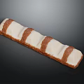 Delicious Long Striped Pastry with Creamy White and Chocolate Brown Layers