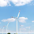 Multiple White Wind Turbine Blades With Red Markings Under Blue Sky And Clouds