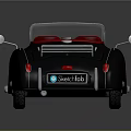 Vintage Convertible Sports Car With Black Body Red Seats And Open Top Design