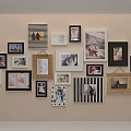 Diverse Framed Photo Wall with Various Pictures Hanging on Beige Wall